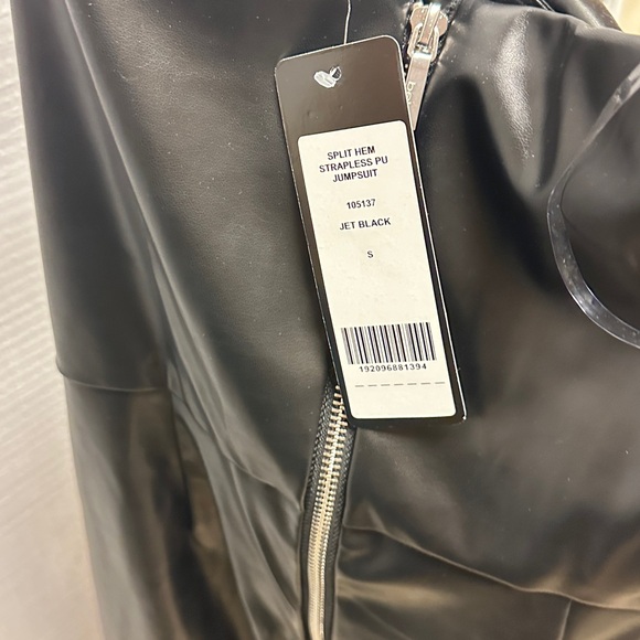 BEBE SPLIT HEM STRAPLESS VEGAN LEATHER JUMPSUIT - Picture 6 of 7